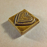 Fancy Heart 2"x2" Ceramic Handmade Tile - Honey Glaze edge view