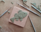 Fish 3"x3" Ceramic Handmade Tile - sculpting process