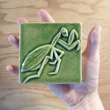 Preying Mantis 4"x4" Ceramic Handmade Tile - size reference Spearmint Glaze