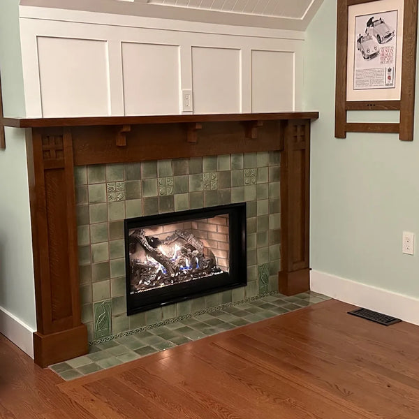 A Stunning Fireplace with Handmade Tiles and Custom Woodwork