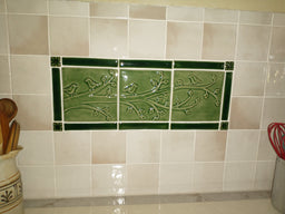 A Handmade Tile Mural in Two Shades of Green