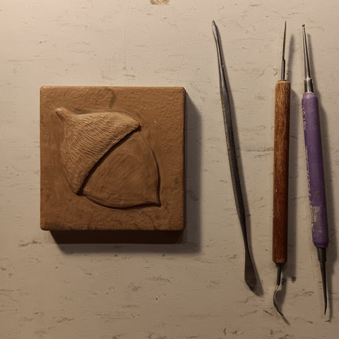 Acorn 3"x3" Ceramic Handmade Tile - Sculpting process