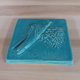 Nesting Swift 4"x4" Ceramic Handmade Tile - blue isle glaze edge view